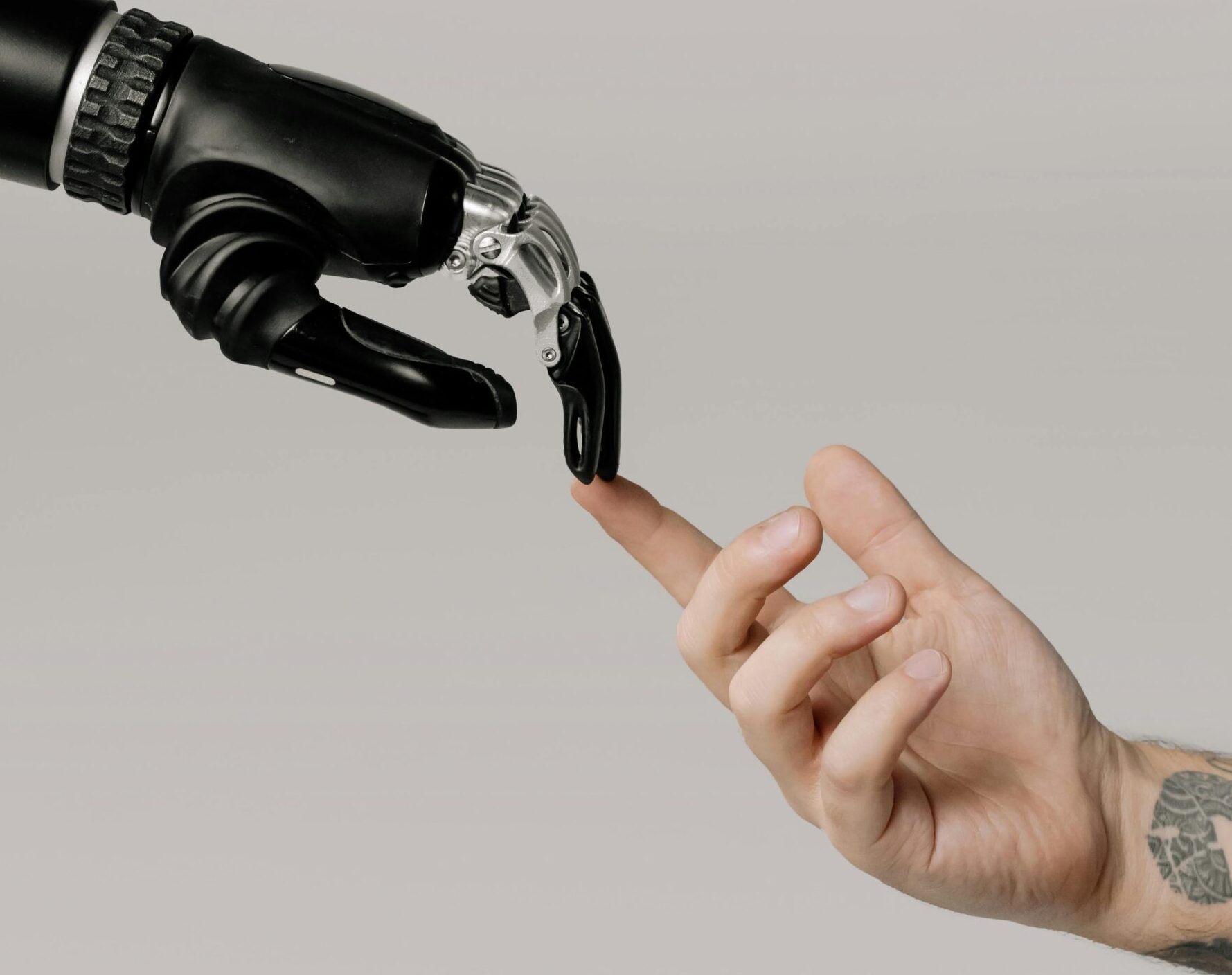 Bionic hand touching human hand